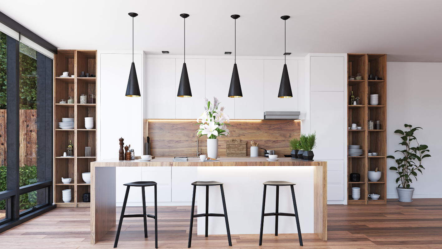 A kitchen with a center island surrounded by stools