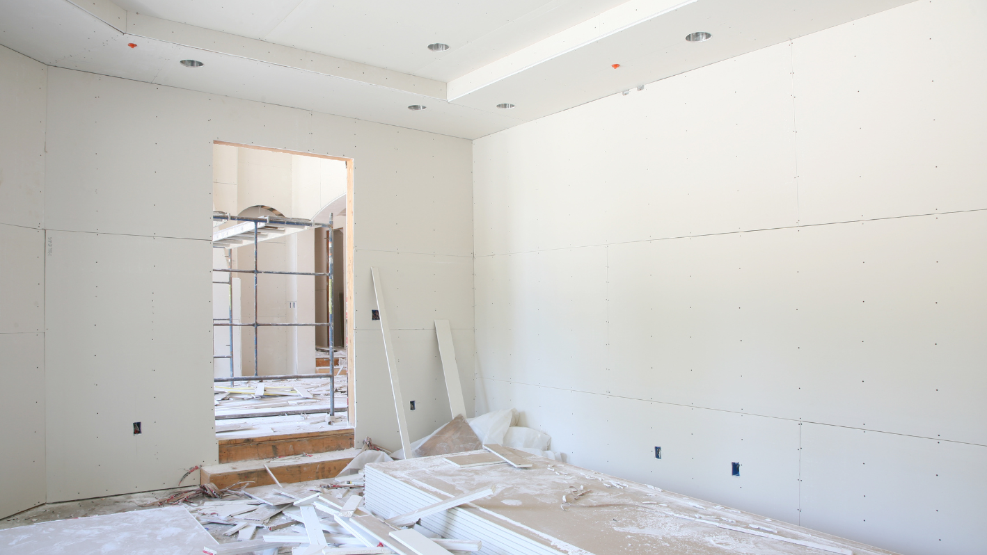 A room that is under construction with a ladder